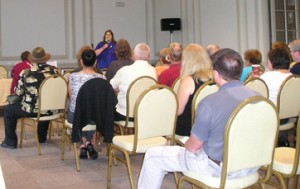 Mary speaks to the audience at the launch of her flood book's second edition